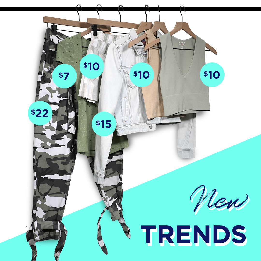 Girls clothing on hanging rack with "new trends" spelled out 